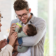 new father with baby with a Temecula health insurance agent.